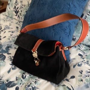 Black suede envelope shoulder bag.